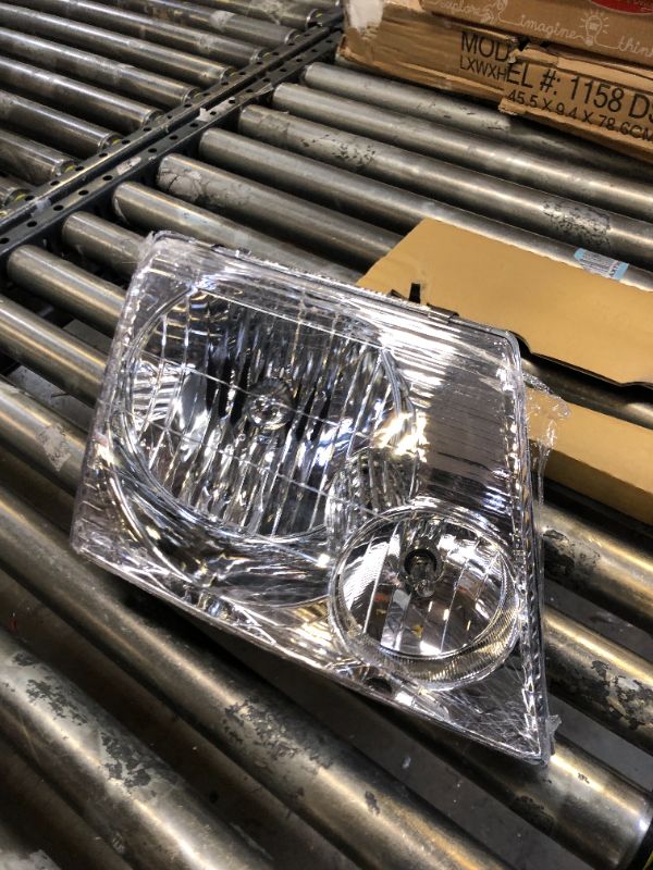 Photo 1 of Dorman 1590527 Passenger Side Headlight Assembly Compatible with Select Ford Models