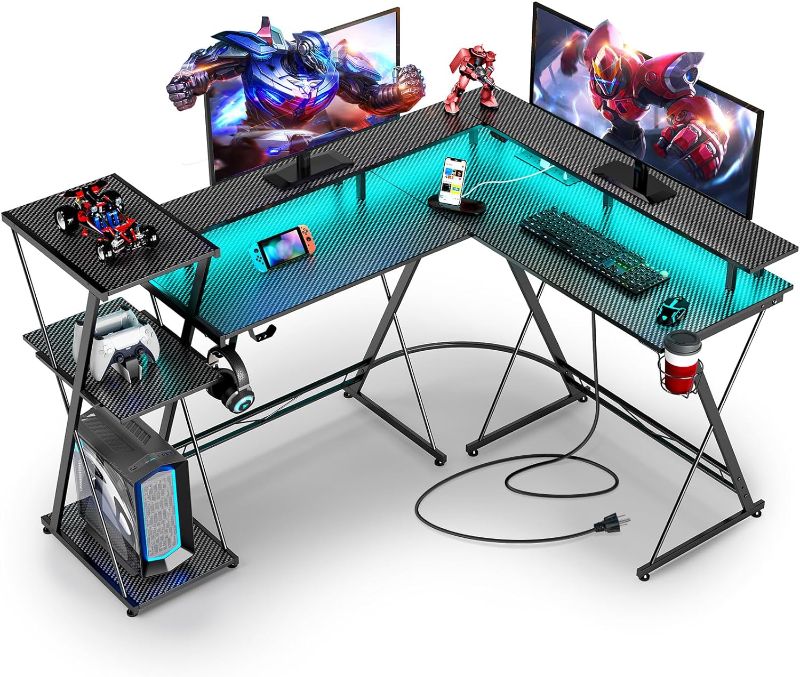 Photo 1 of SEVEN WARRIOR L Shaped Gaming Desk with LED Lights & Power Outlets, 50” Reversible Computer Desk with Storage Shelf & Monitor Stand, Corner Desk with Cup Holder, with Headphone Hook, Black
