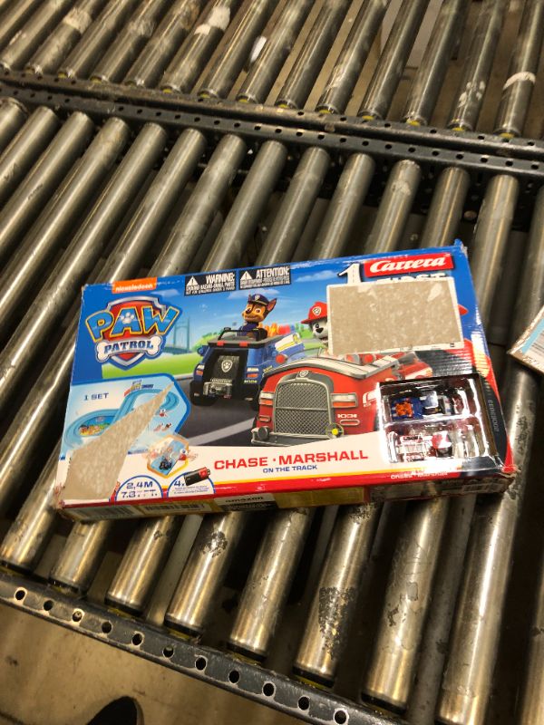 Photo 2 of Carrera First Paw Patrol - Slot Car Race Track - Includes 2 Cars: Chase and Marshall - Battery-Powered Beginner Racing Set for Kids Ages 3 Years and Up, Multi