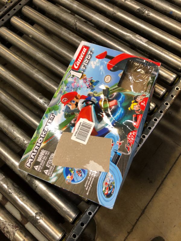 Photo 3 of Carrera First Mario Kart - Slot Car Race Track With Spinners - Includes 2 Cars: Mario and Yoshi - Battery-Powered Beginner Racing Set for Kids Ages 3 Years and Up Mario Kart w/ Spinners