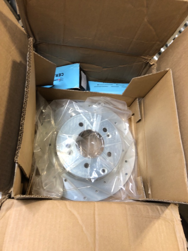 Photo 2 of Drilled and Slotted Silver Zinc Brake Rotor 631-03021L SET OF 4 WITH BRAKE PADS 