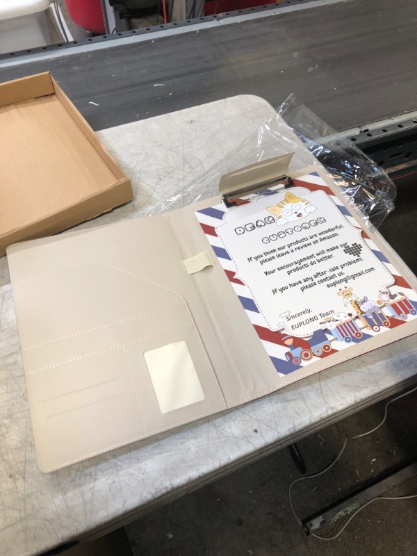 Photo 1 of BROWN CLIPBOARD 