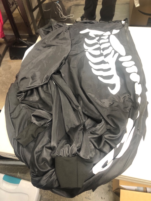 Photo 1 of costume  onsie- skeleton
size- xl 