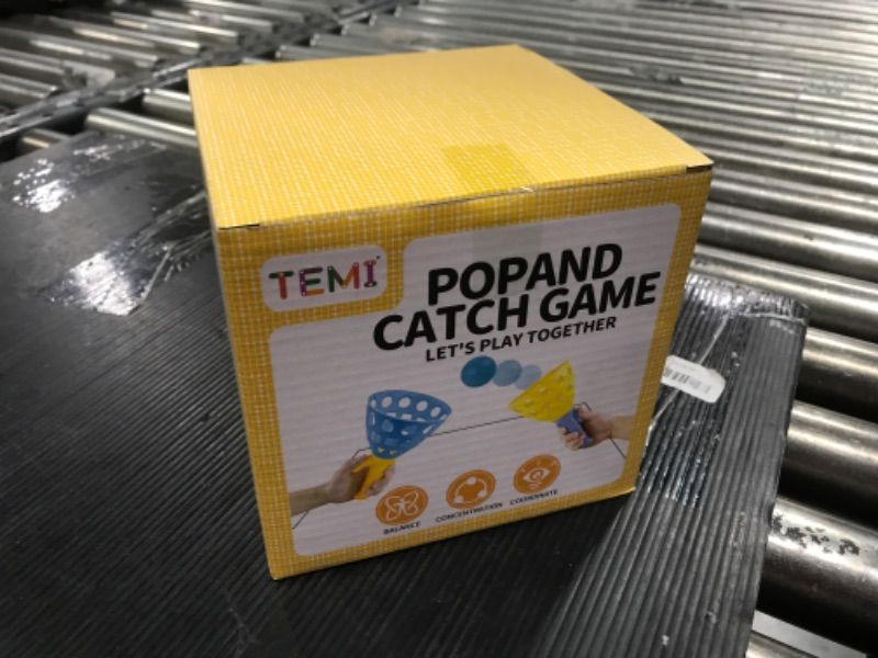 Photo 2 of TEMI Pop Pass Catch Ball Game with 4 Catch Launcher Baskets and 20 Balls, Beach Toys Backyard Outdoor Indoor Game Age 3 4 5 6 7 8 9 10+ Years Old Boys Girls Kids Adults Family