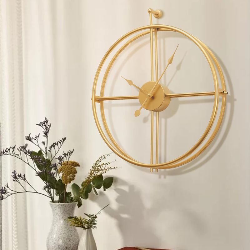 Photo 1 of Large Wall Clock Gold Wall Clock Modern Metal Clock for Living Room Decor Minimalism Farmhouse Clock, Non Ticking Battery Operated Clock for Bedroom Kitchen Office.

