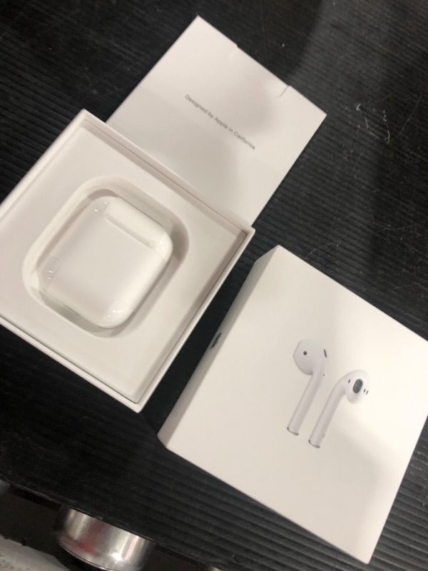 Photo 3 of Apple AirPods with Charging Case (Latest Model)