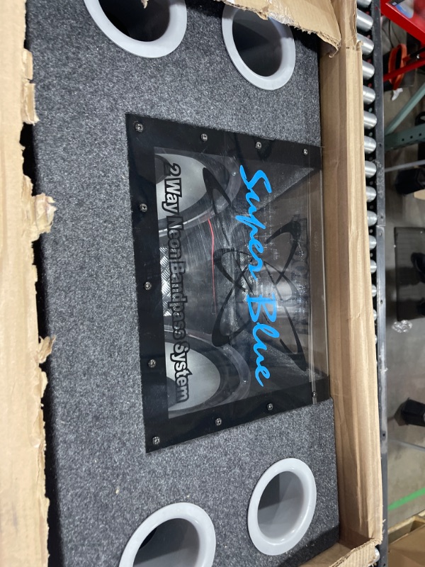 Photo 1 of Pyramid 12" 1200W Car Audio Subwoofer - 2 Way Neon Bandpass Speaker System w/ Blue Lights, DC 12V Input/4 Ohm/32Hz-1KHz Freq.Res w/ Plexi-Glass Front Window & Silver Polypropylene Cone - BNPS122,Black 12 inch Speakers