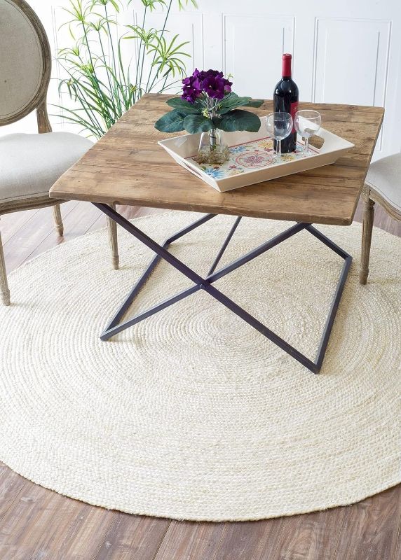 Photo 1 of FRELISH DECOR Handwoven Jute Area Rug - Off-White Round Rustic Vintage Braided Reversible Rug - Eco Friendly Rug for Bedroom - Kitchen - Living Room - Farmhouse (6' Round - Off-White) 