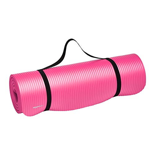 Photo 1 of  Amazon Basics Extra Thick Exercise Yoga Gym Floor Mat with Carrying Strap - 74 X 24 X .5 Inches, Pink 