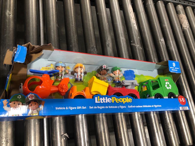 Photo 2 of Fisher-Price Little People Toddler Playset Around The Neighborhood Vehicle Pack, 4 Toy Cars & Trucks & 4 Figures (Style A - Helocopter, Dump Truck, Fire Truck, and Garbage Truck)