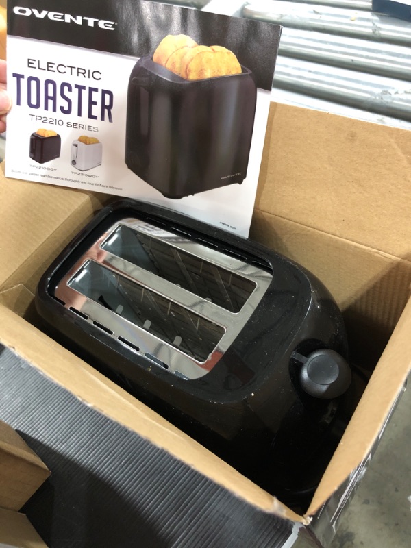 Photo 1 of OVENTE Electric 2 Slice Toaster Machine with 6-Shade Toast Settings, 700W Power, Removable Crumb Tray and Compact Design Perfect for Toasting Bread, Bagels, Waffles and Puff Pastry, Black TP2210B