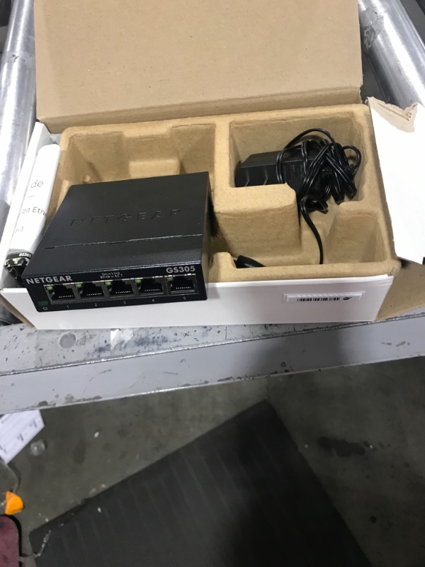 Photo 1 of NETGEAR 5-Port Gigabit Ethernet Unmanaged Switch (GS305) - Home Network Hub, Office Ethernet Splitter, Plug-and-Play, Silent Operation, Desktop or Wall Mount
