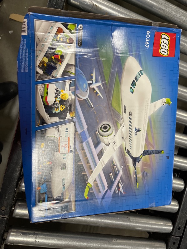 Photo 2 of LEGO City Passenger Airplane 60367 Building Toy Set; Fun Airplane STEM Toy for Kids with a Large Airplane, Passenger Bus, Luggage Truck, Container Loader, and 9 Minifigures Standard Packaging