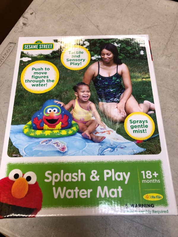 Photo 1 of Elmo splash pad 