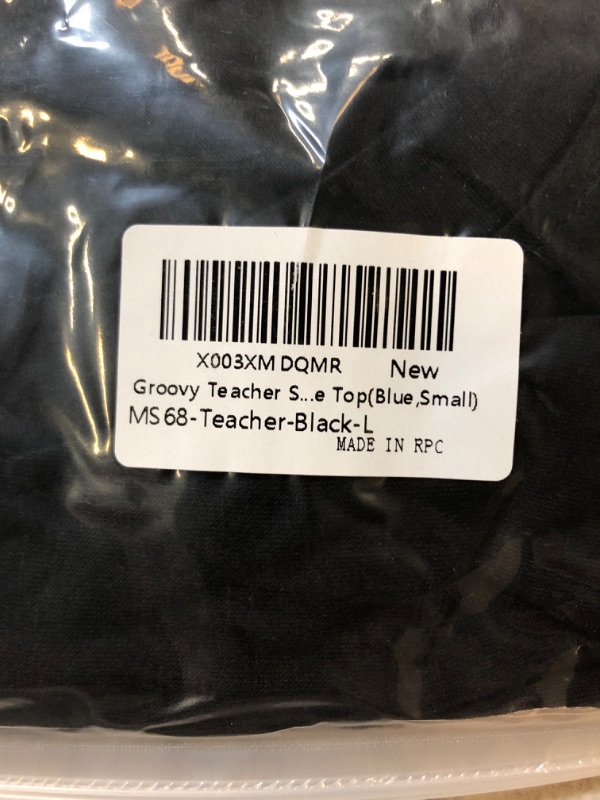 Photo 2 of GROOVY TEACHER T-SHIRT
SIZE LARGE 