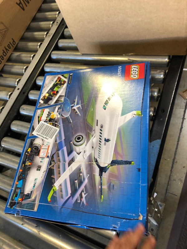 Photo 2 of Lego City Passenger Airplane 60367 Building Toy Set; Fun Airplane STEM Toy for Kids with a Large Airplane, Passenger Bus, Luggage Truck, Container Loader, and 9 Minifigures Standard Packaging