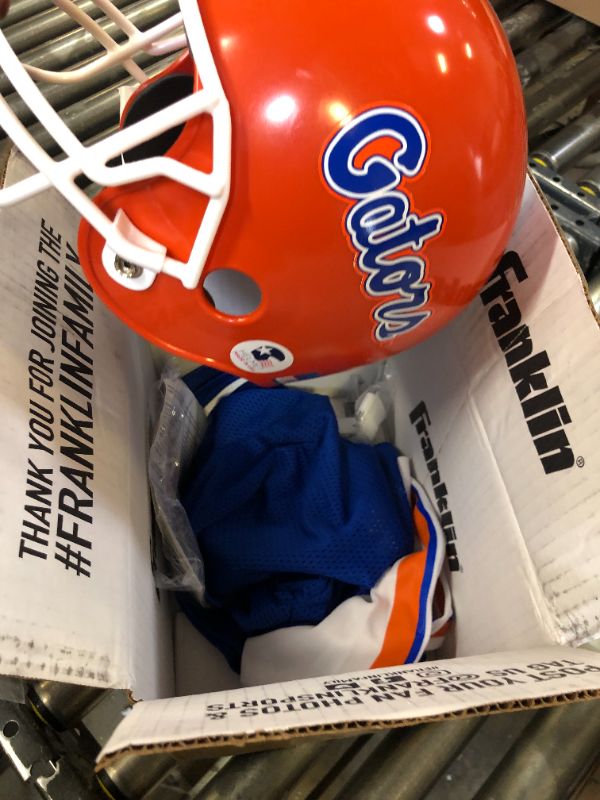 Photo 2 of Franklin Sports NCAA Kids Football Uniform Set-Youth Football Costume for Boys & Girls - Set Includes Helmet, Jersey & Pants Florida Gators Medium