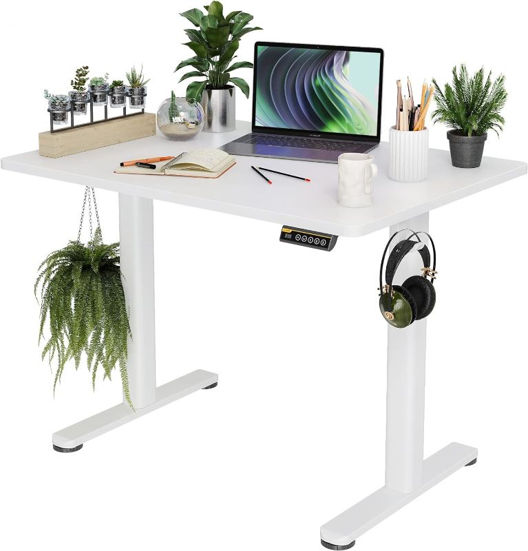 Photo 1 of Electric Standing Desk, Adjustable Height Stand up Desk, Sit Stand Home Office Desk with Splice Board, White Frame/White Top