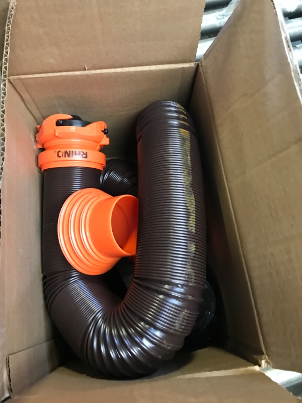 Photo 2 of Camco RhinoFLEX RV Sewer Hose Kit with Swivel Transparent Elbow and 4-in-1 Dump Station Fitting, Brown, 15 Feet (39770) 15ft Sewer Hose Kit Frustration-Free Packaging