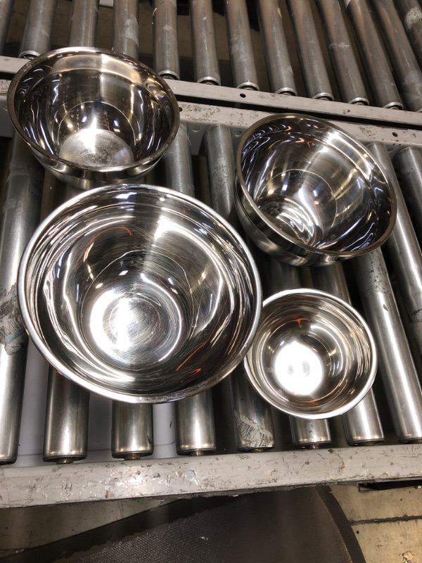 Photo 1 of 4 piece stainless steel mixing bowls of various sizes 