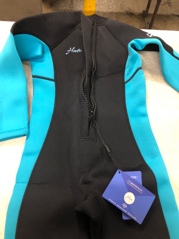 Photo 1 of 7X Kids Herto wet suit