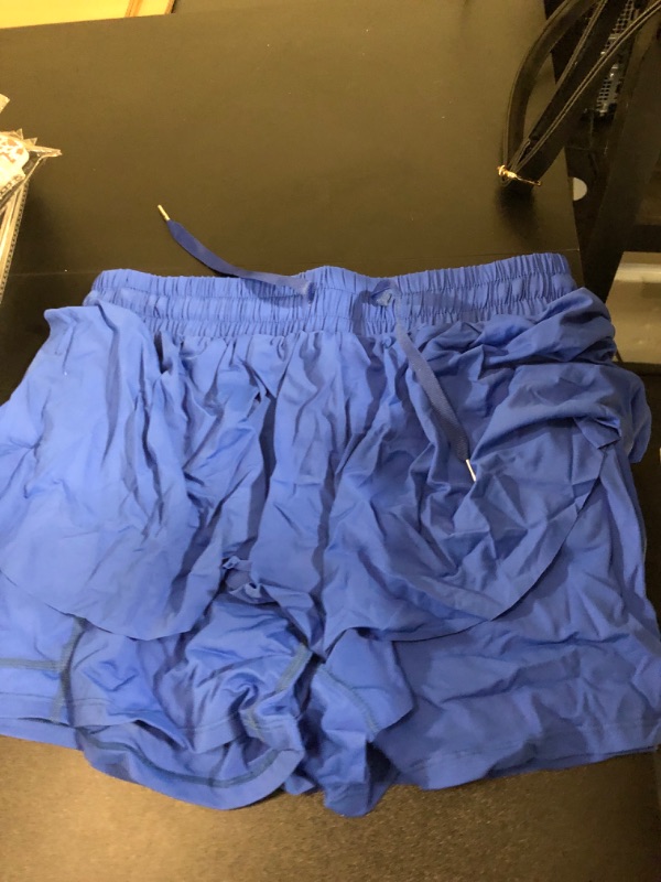 Photo 1 of Women's 2 in 1 running shorts ( size large ) 