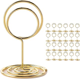 Photo 1 of 25 Pcs Table Number Holders, Mini Place Card Holder for Table, Steel Table Sign Holders, Photo Picture Holders for Centerpieces, Table Card Holders for Memo Notes, Weddings, Restaurants, Party (Gold) https://a.co/d/hHCKo2H