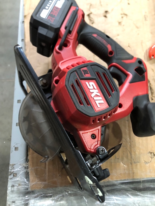 Photo 2 of ****ONLY THE SAW NON REFUNDABLE****
SKIL PWR CORE 12 Brushless 12V Compact 5-1/2 Inch Circular Saw, Includes 4.0Ah Lithium Battery and PWR JUMP Charger - CR541802, Red