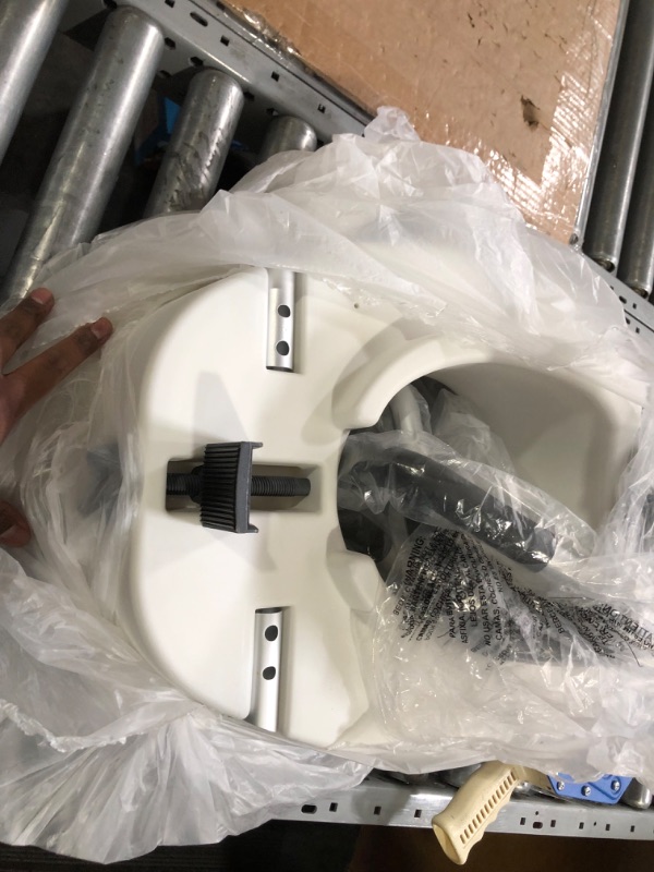 Photo 1 of *** UNKNOWN IF PARTS MISSING *** Drive Medical RTL12027RA 2-in-1 Raised Toilet Seat with Removable Padded Arms, Standard Seat
