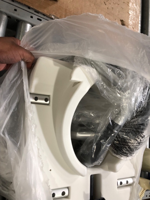 Photo 1 of *** UNKNOWN IF PARTS MISSING *** Drive Medical RTL12027RA 2-in-1 Raised Toilet Seat with Removable Padded Arms, Standard Seat
