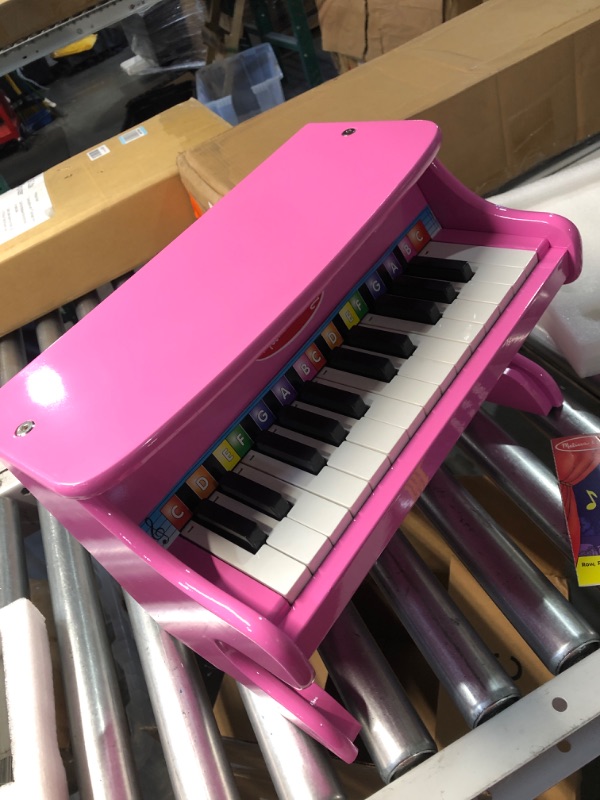 Photo 1 of **NON REFUNDABLE ITEM***(FOR PARTS ONLY))
Melissa & Doug Learn-to-Play Pink Piano With 25 Keys and Color-Coded Songbook
