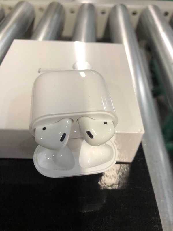 Photo 2 of Apple AirPods with Charging Case (Latest Model)