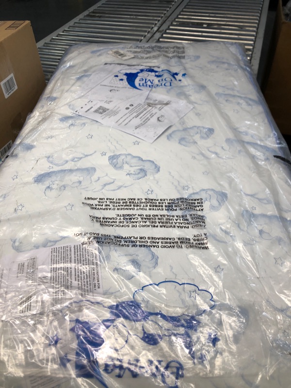 Photo 2 of ***DAMAGED - TORN - SEE PICTURES***
Dream On Me Sweet Dreams 88 Coil Spring Crib and Toddler Bed 6" Mattress in Blue, Green Guard Gold Certified, 17 lb, 52"L x 28"W x 6"Th