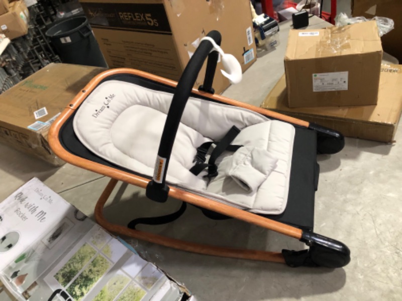 Photo 3 of ***USED - NO PACKAGING - SEE PICTURES***
Dream on Me Rock with me 2-in-1 Rocker and Stationary Seat | Compact Portable Infant Rocker with Removable Toys Bar & Hanging Toys in Black & Grey