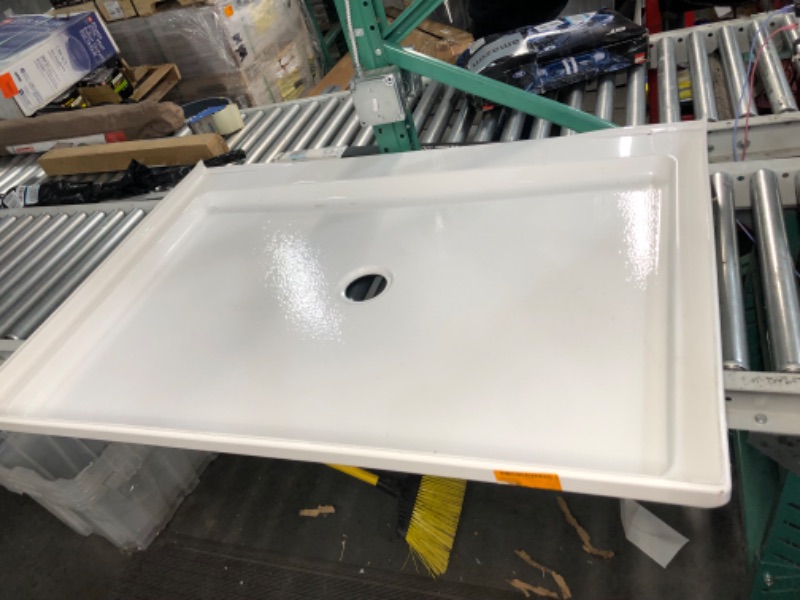 Photo 3 of ***USED - COVERED IN SCRATCHES - NO PACKAGING***
48 in. L x 34 in. W Alcove Shower Pan Base with Center Drain in High Gloss White