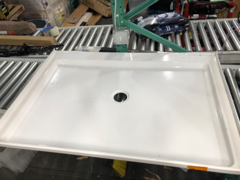 Photo 5 of ***USED - COVERED IN SCRATCHES - NO PACKAGING***
48 in. L x 34 in. W Alcove Shower Pan Base with Center Drain in High Gloss White