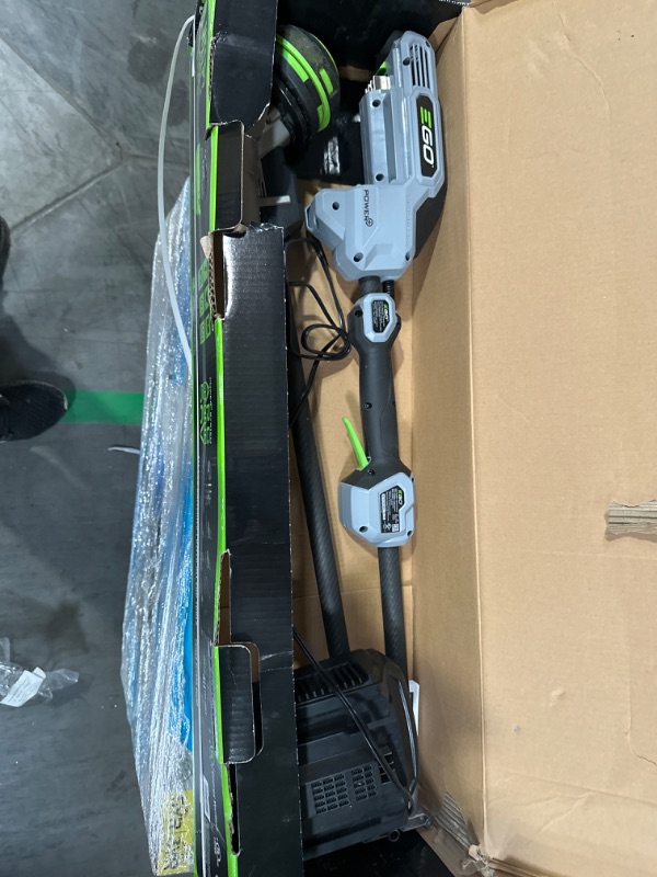 Photo 1 of **MISSING BATTERY**
EGO Power+ ST1521S 15-Inch String Trimmer with POWERLOAD and Carbon Fiber Split Shaft Weed Wacker 2.5Ah Battery and Charger Included & Worx WG896 12 Amp 7.5" Electric Lawn Edger & Trencher Trimmer+ Edger & Trencher 15in Powerload / Car