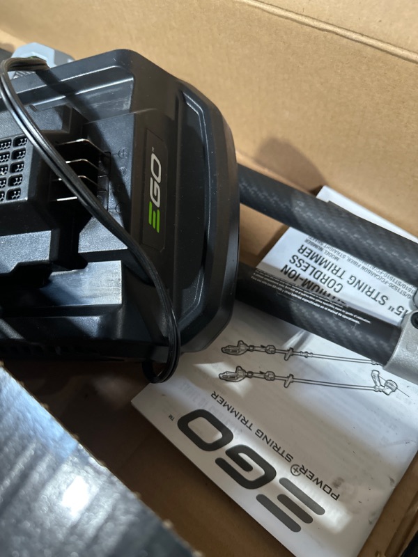 Photo 1 of **MISSING BATTERY**
EGO Power+ ST1521S 15-Inch String Trimmer with POWERLOAD and Carbon Fiber Split Shaft Weed Wacker 2.5Ah Battery and Charger Included & Worx WG896 12 Amp 7.5" Electric Lawn Edger & Trencher Trimmer+ Edger & Trencher 15in Powerload / Car