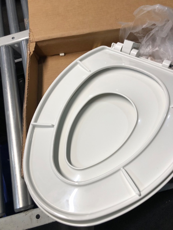 Photo 3 of **MINOR DAMAGE BROKEN HINGE SEEMS FIXABLE**
Mayfair NextStep2 Toilet Seat with Built-In Toddler Potty Training Seat, Slow Close, Easy Clean, Magnetic Removable Kids Seat, ELONGATED, White