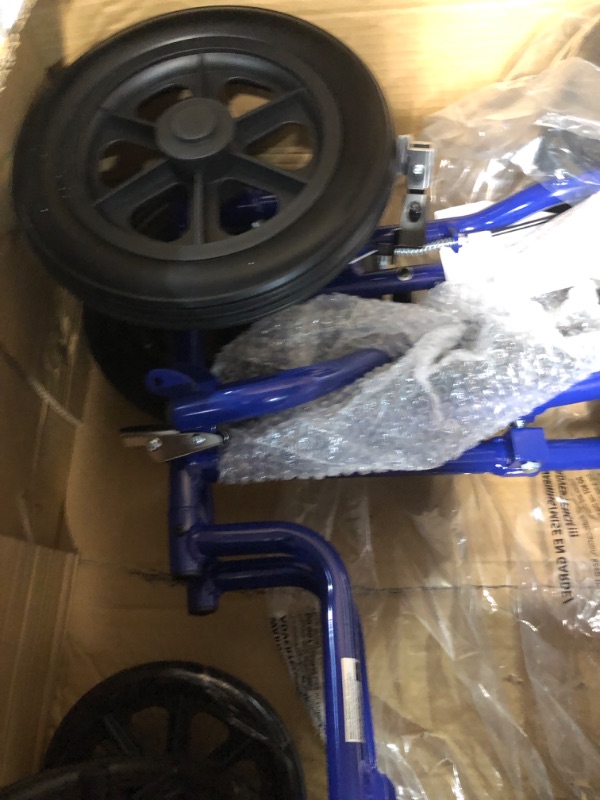 Photo 1 of Medline Lightweight Transport Wheelchair with Handbrakes, Folding Transport Chair for Adults has 12 inch Wheels, Blue Mds808210ab