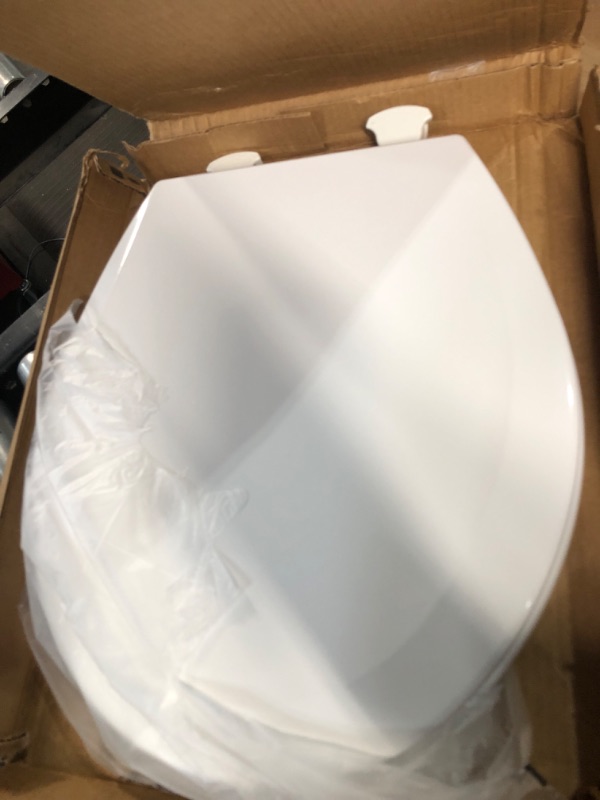 Photo 2 of ***USED - LIKELY MISSING PARTS - UNABLE TO VERIFY FUNCTIONALITY***
Bemis 500EC 390 Toilet Seat with Easy Clean & Change Hinges, Round, Durable Enameled Wood, Cotton White Cotton White 1 Pack Round Toilet Seat