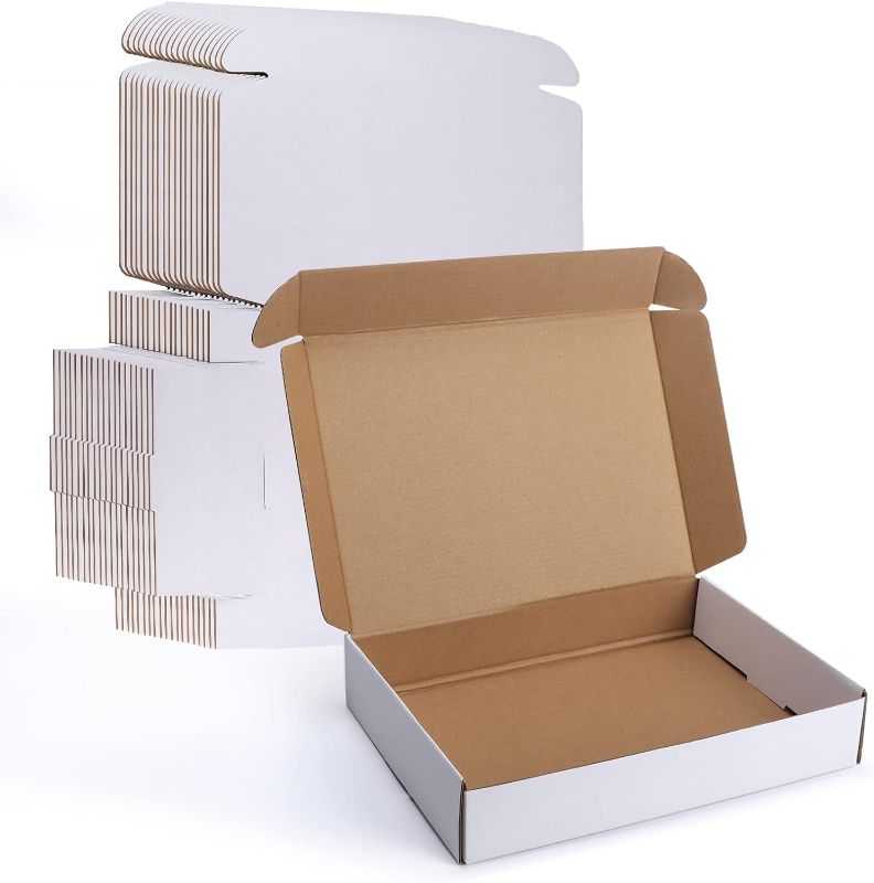 Photo 1 of *STOCK IMG AS REF* 11X18X3 CORRUGATED CARDBOARD BOX MAILER 20 PACK 