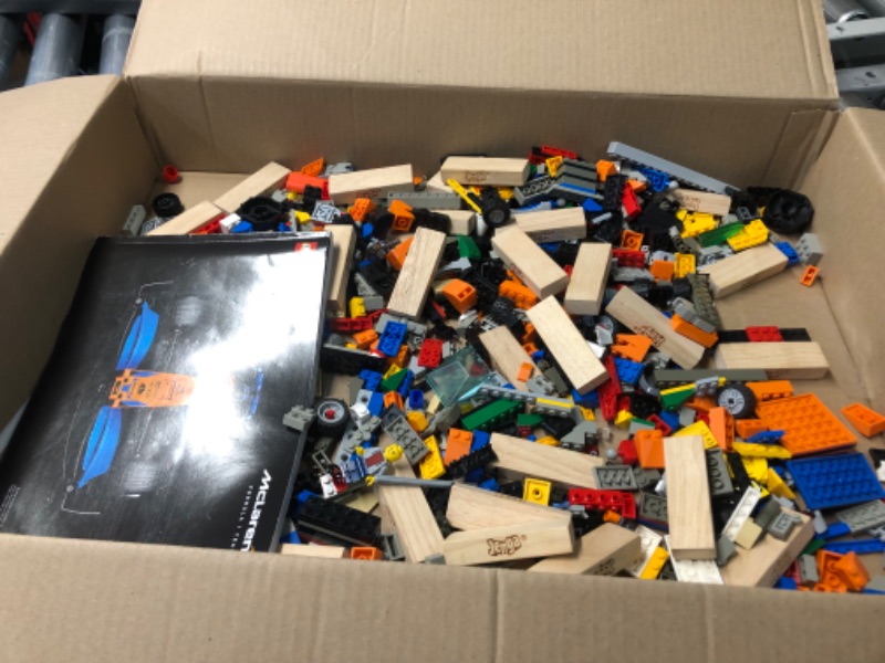 Photo 2 of ***PARTS ONLY/NON-RETURNABLE*ALL PIECES LOOSE INSIDE*DAMAGE TO BOX*MISSING PIECES*BONUS JENGA PIECES!!***
LEGO Technic McLaren Formula 1 Race Car 42141 Building Set for Adults (1,434 Pieces) Standard Packaging