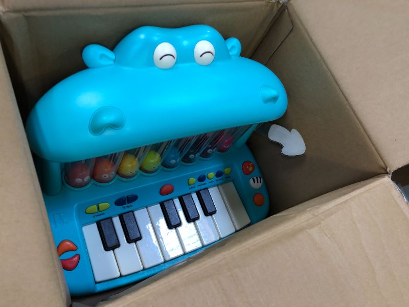 Photo 2 of B. toys- Hippo Pop- Musical Toy Keyboard – Play Piano – Songs, Sounds & Lights – Musical Instrument for Toddlers, Kids – 12 Months +