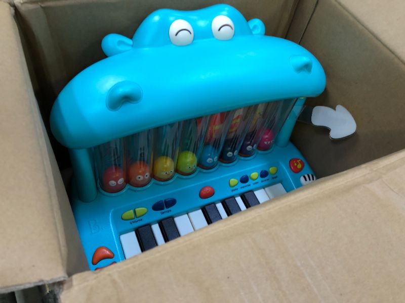 Photo 3 of B. toys- Hippo Pop- Musical Toy Keyboard – Play Piano – Songs, Sounds & Lights – Musical Instrument for Toddlers, Kids – 12 Months +