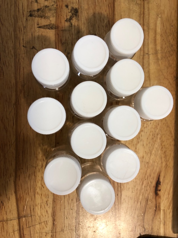 Photo 2 of VASANA 12PCS 15ml Clear Empty Portable Plastic Pill Bottles with White Screw Cap Pill Tablet Holder Storage Container Travel Pill Packing Jar for Liquid Solid Powder Medicine Chemical Dispense