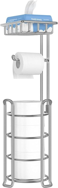 Photo 1 of Toilet Paper Holder Toilet Paper Stand with Shelf Free Standing Toilet Paper Roll Holder Stand with Metal Toilet Paper Dispenser Sturdy Toilet Tissue Holder Storage Shelf for Bathroom (Silver)