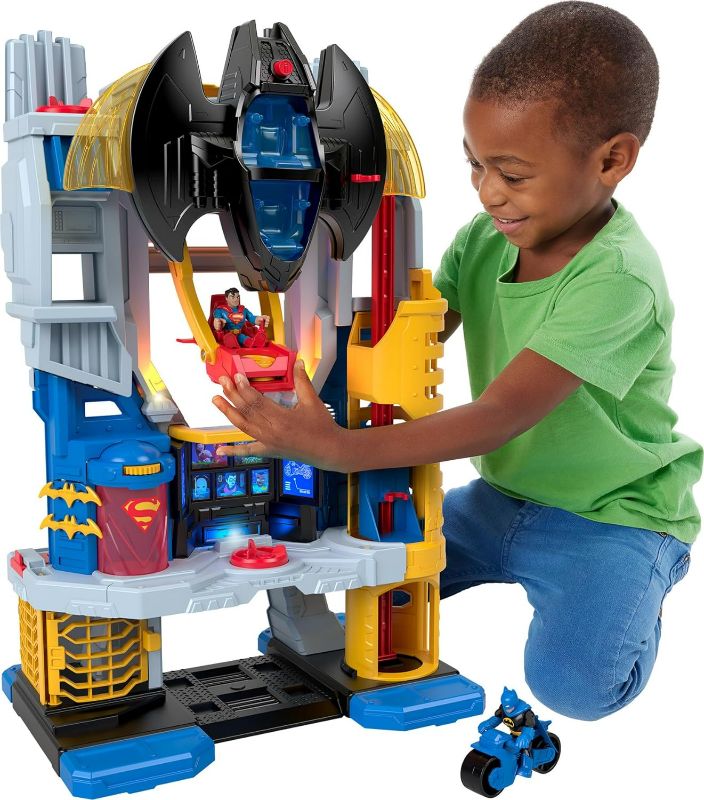 Photo 1 of Fisher-Price Imaginext DC Super Friends Batman Playset Ultimate Headquarters 2-Ft Tall with Lights Sounds Figures & Accessories for Ages 3+ Years