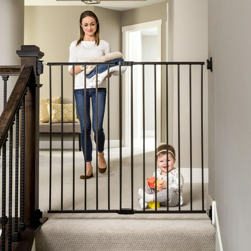 Photo 1 of Regalo 2-in-1 Extra Tall Easy Swing Stairway and Hallway Walk Through Baby Gate, Black 1 Count