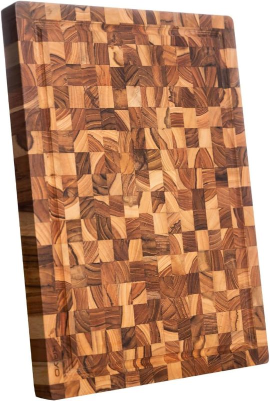 Photo 1 of KAIYO, Teak Wood Cutting Board in size 1,4 x 11,9 x 16,5 inches, Large Wood Cutting Board with Deep Juice Groove, Charcuterie Cheese Board, or Serving Trays